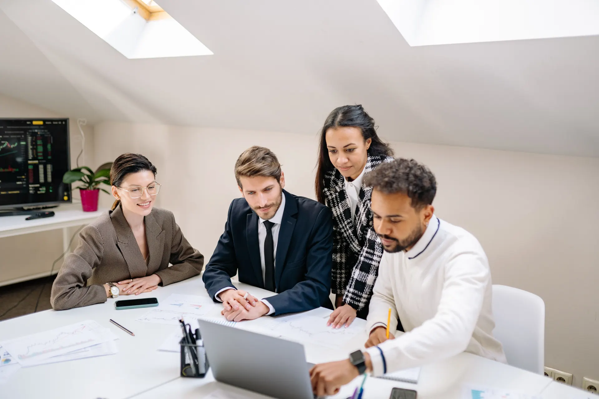 A consulting team collaborating around a table